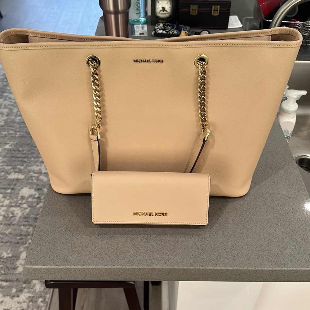 Michael Kors Jet Set Tote with matching wallet. Excellent condition. Nude Gold